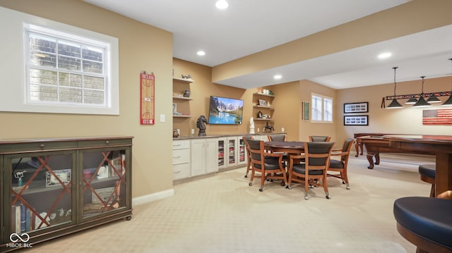 dining space with light carpet, recessed lighting, and baseboards