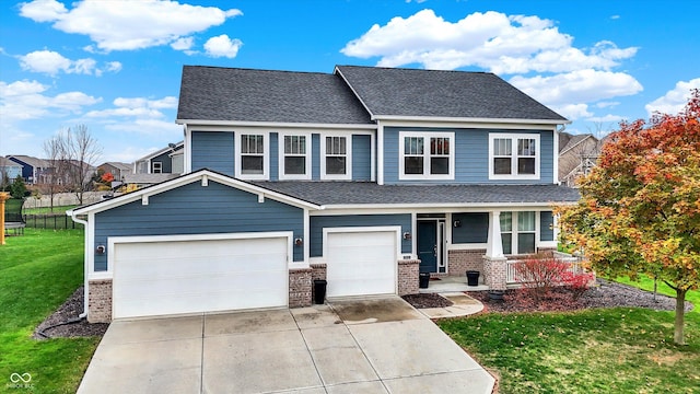 view of front facade featuring brick siding, a porch, concrete driveway, a front yard, and a garage