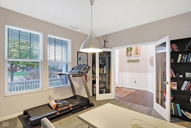 workout area featuring visible vents and french doors