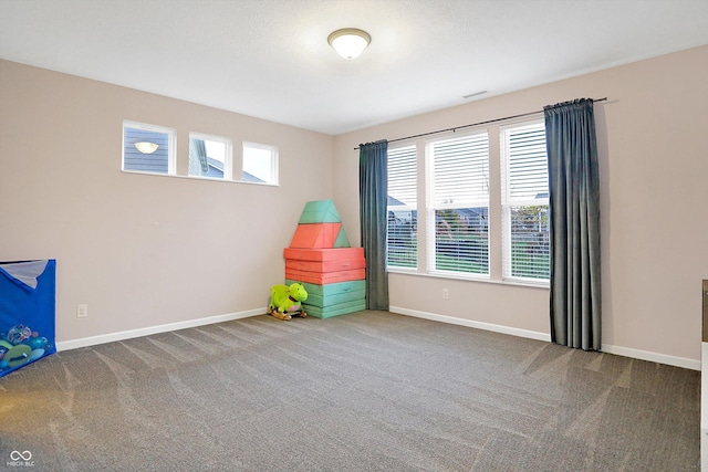 playroom featuring visible vents, baseboards, and carpet floors