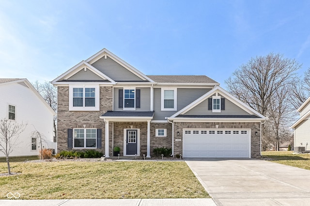 view of front facade featuring a front yard, central air condition unit, concrete driveway, and brick siding