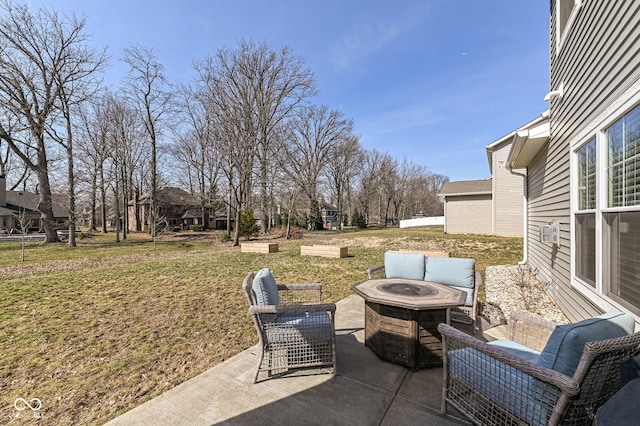 view of patio with a fire pit