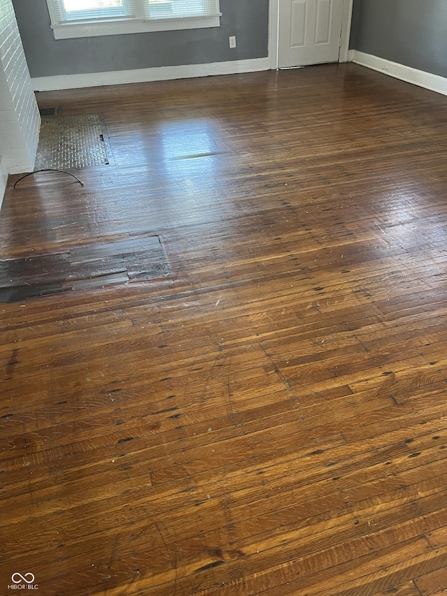 room details with wood finished floors and baseboards