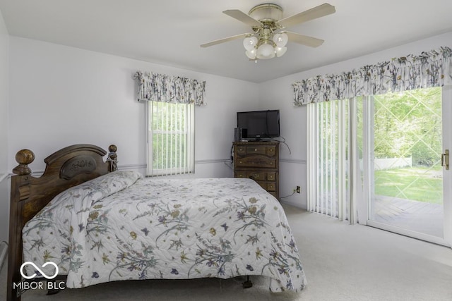 6204 S Madison Ave, Indianapolis, IN 46227 - bedroom featuring access to exterior, carpet floors, and a ceiling fan