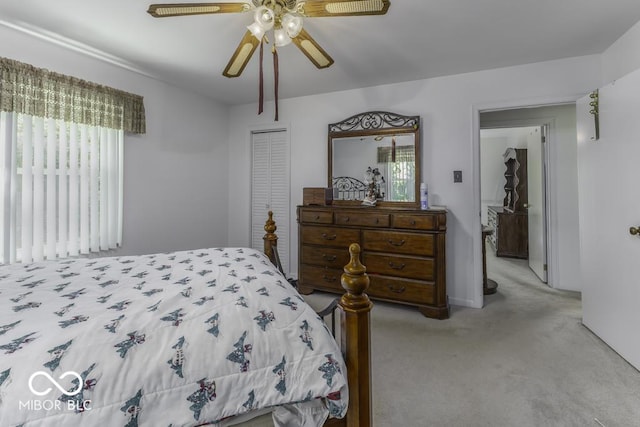 6204 S Madison Ave, Indianapolis, IN 46227 - bedroom with light colored carpet, a closet, and ceiling fan