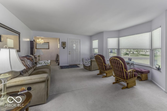 6204 S Madison Ave, Indianapolis, IN 46227 - carpeted living room with a chandelier and baseboards