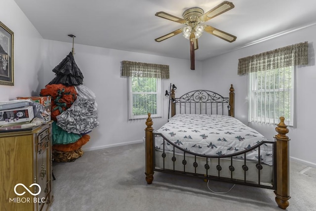 6204 S Madison Ave, Indianapolis, IN 46227 - carpeted bedroom with baseboards and ceiling fan