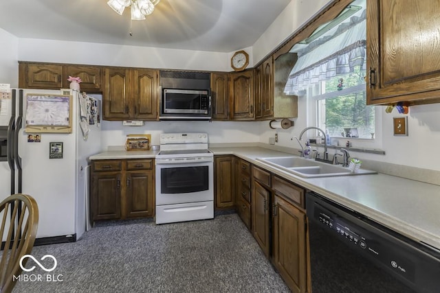 6204 S Madison Ave, Indianapolis, IN 46227 - kitchen with white appliances, light countertops, and ceiling fan