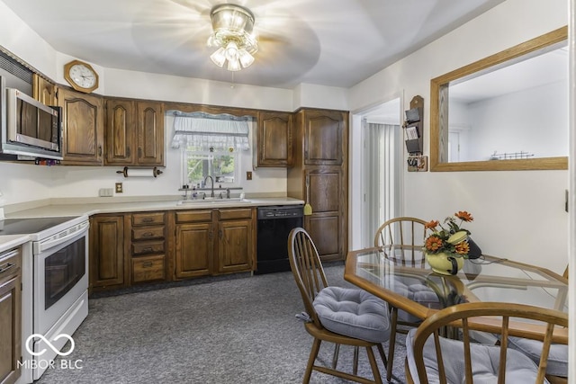 6204 S Madison Ave, Indianapolis, IN 46227 - kitchen featuring black dishwasher, electric range, dark carpet, a ceiling fan, and stainless steel microwave