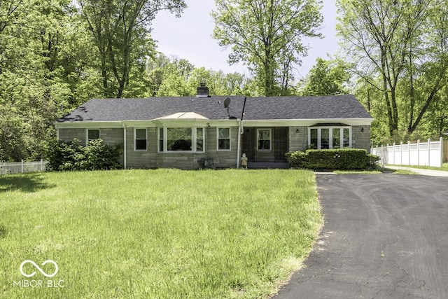 6204 S Madison Ave, Indianapolis, IN 46227 - ranch-style house featuring a chimney, stone siding, driveway, and a shingled roof
