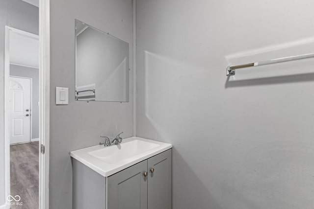 bathroom featuring vanity and wood finished floors