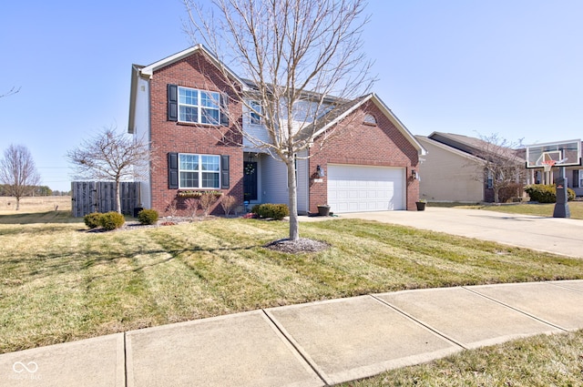 traditional home with brick siding, an attached garage, fence, a front yard, and driveway