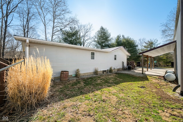 view of property exterior with a patio