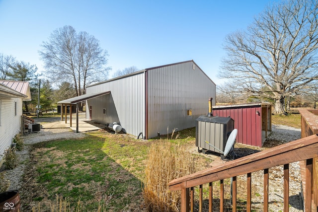 exterior space featuring central AC unit