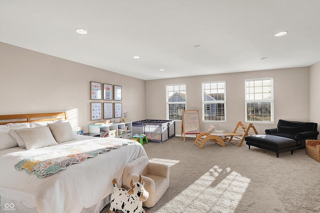 carpeted bedroom featuring recessed lighting