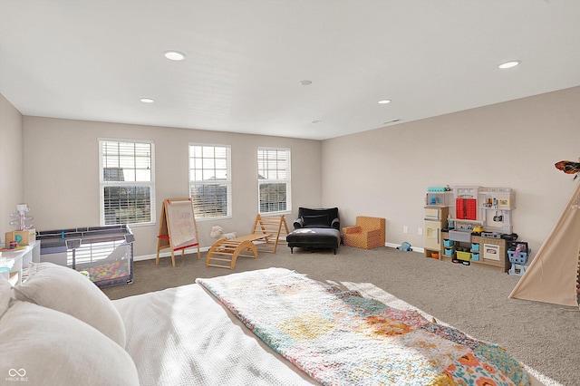 bedroom with recessed lighting, baseboards, and carpet floors