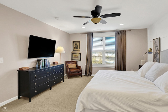 bedroom with recessed lighting, baseboards, light carpet, and ceiling fan