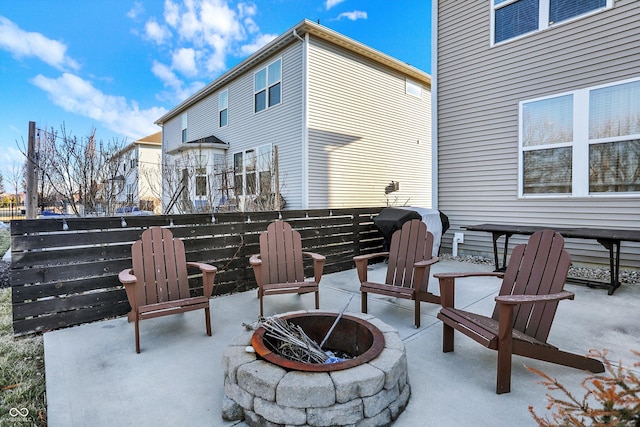 view of patio / terrace with an outdoor fire pit