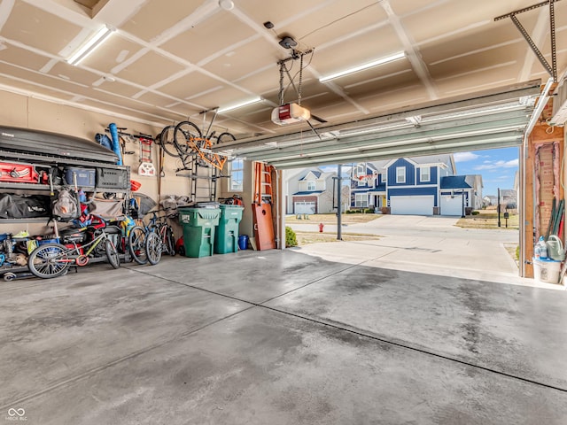 garage featuring a garage door opener