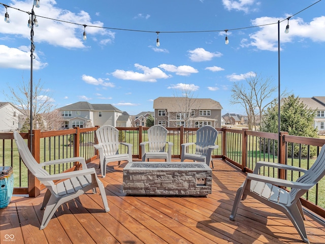 wooden terrace featuring a residential view