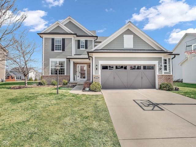 craftsman-style home with a garage, brick siding, concrete driveway, and a front yard