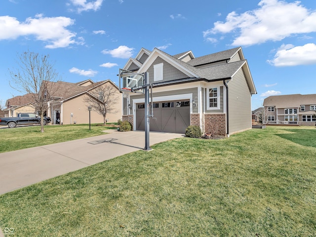 view of front of house with brick siding, a garage, driveway, and a front lawn