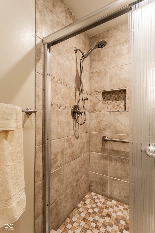 bathroom featuring a stall shower