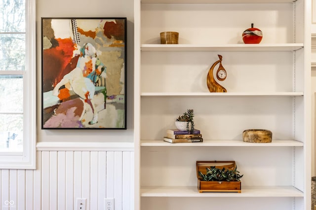 room details with built in shelves and wainscoting