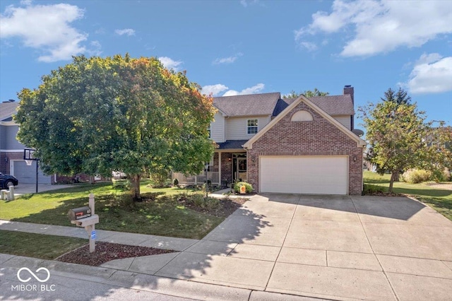 view of front of property featuring concrete driveway, a front yard, a garage, brick siding, and a chimney