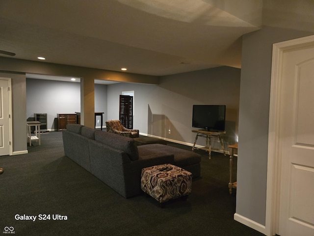 carpeted living room with recessed lighting and baseboards