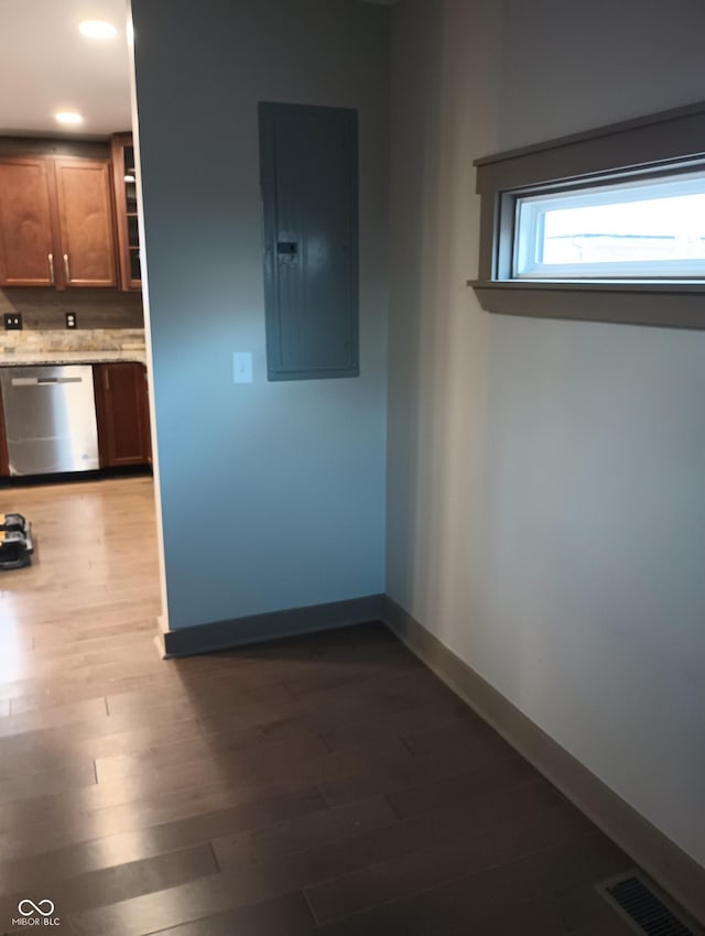 5603 S Randolph St, Indianapolis, IN 46227 - corridor featuring recessed lighting, baseboards, visible vents, electric panel, and wood finished floors