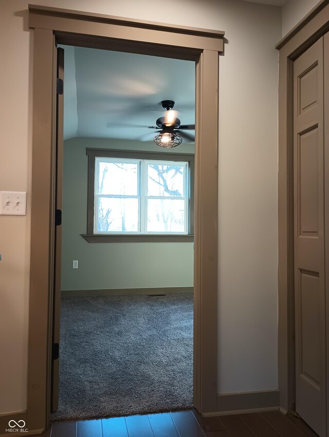 5603 S Randolph St, Indianapolis, IN 46227 - hall featuring baseboards, tile patterned flooring, carpet floors, and vaulted ceiling