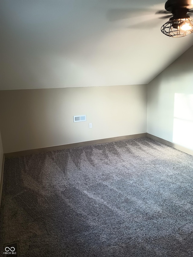 5603 S Randolph St, Indianapolis, IN 46227 - bonus room with carpet flooring, a ceiling fan, visible vents, baseboards, and lofted ceiling