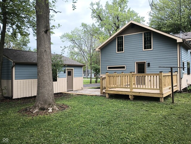 5603 S Randolph St, Indianapolis, IN 46227 - rear view of property with a deck and a lawn