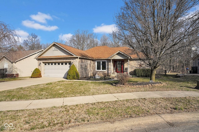 ranch-style home with a garage, brick siding, concrete driveway, and a front lawn