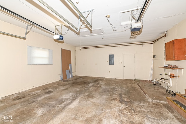 garage with electric panel and a garage door opener