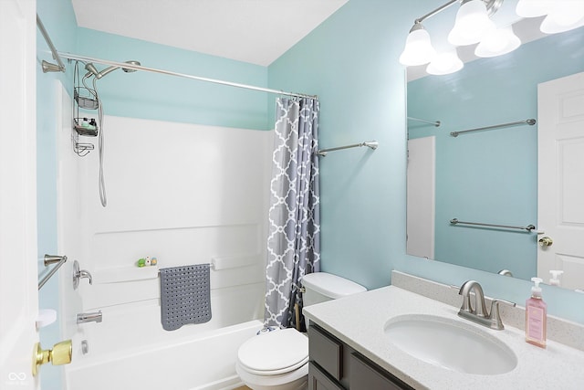 bathroom with vanity, shower / tub combo, and toilet