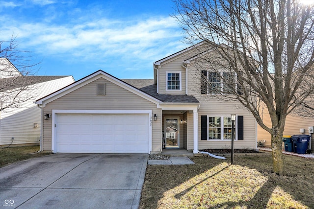 traditional-style home with an attached garage, concrete driveway, and roof with shingles