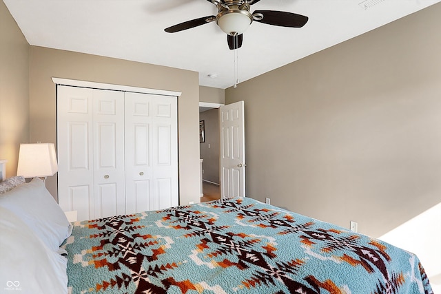 bedroom with a closet and a ceiling fan