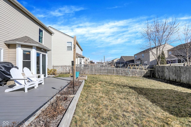 view of yard featuring a residential view and a fenced backyard