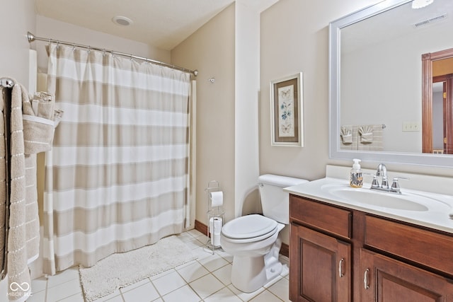 full bath with visible vents, toilet, a shower with shower curtain, tile patterned floors, and vanity