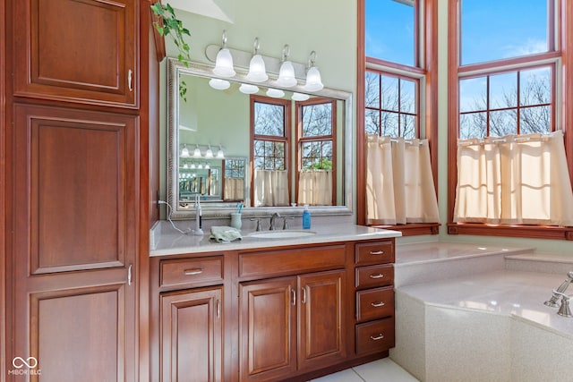 full bath featuring a bath and vanity