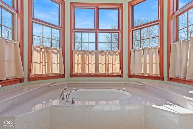 bathroom with a garden tub