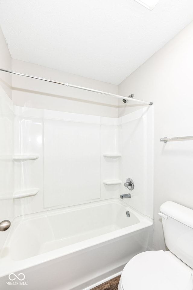 full bathroom with toilet and shower / tub combination