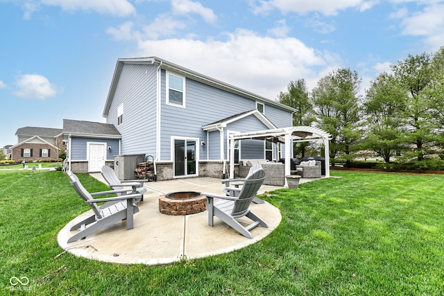 back of property with a patio area, brick siding, a lawn, and a pergola