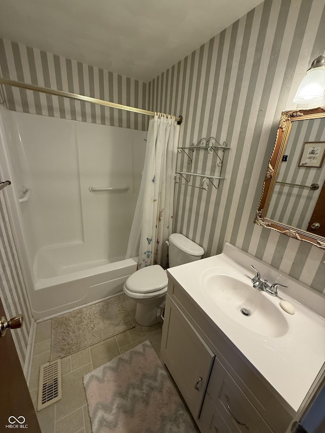 full bathroom with visible vents, toilet, wallpapered walls, and vanity