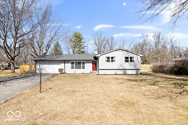 view of front of house with a front lawn and driveway