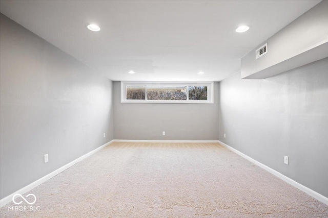 basement featuring recessed lighting, baseboards, visible vents, and carpet floors