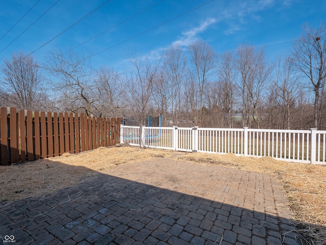 view of patio with fence