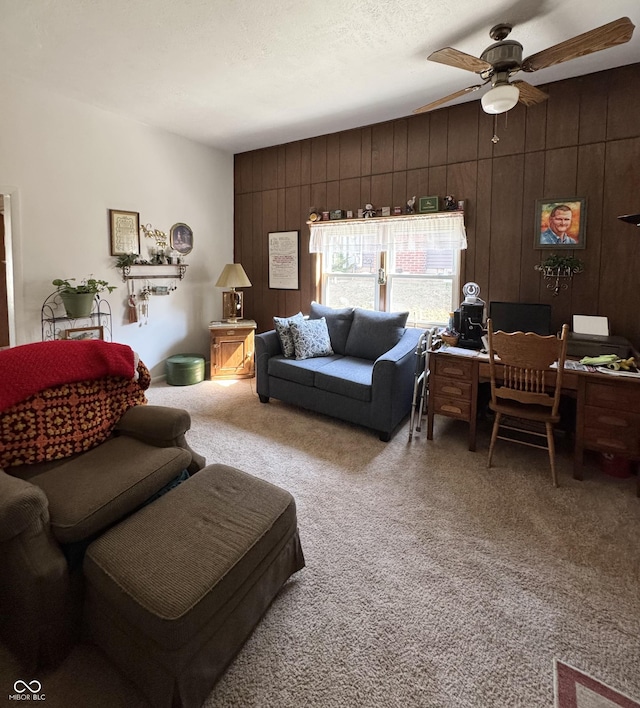 5395 W State Road 38, New Castle, IN 47362 - carpeted living area with a textured ceiling, wood walls, and a ceiling fan